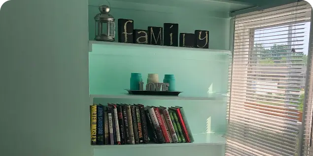 Bookshelf in qiet reflection space at assisted living & hospice care house in Kentwood, MI